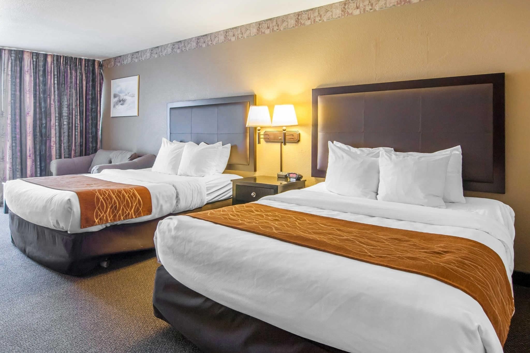 premium bedding, desk, blackout curtains, iron/ironing board