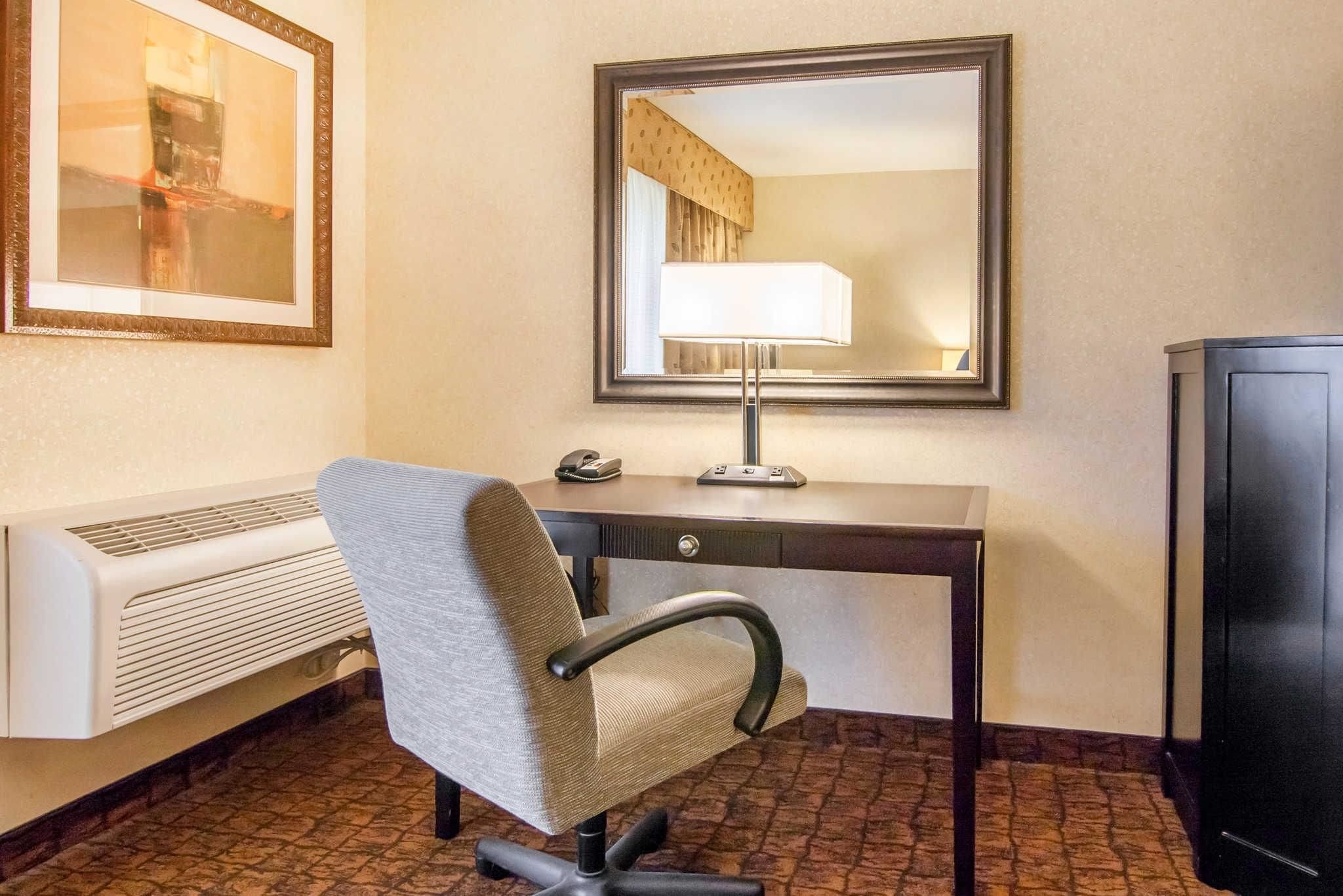 premium bedding, desk, blackout curtains, iron/ironing board