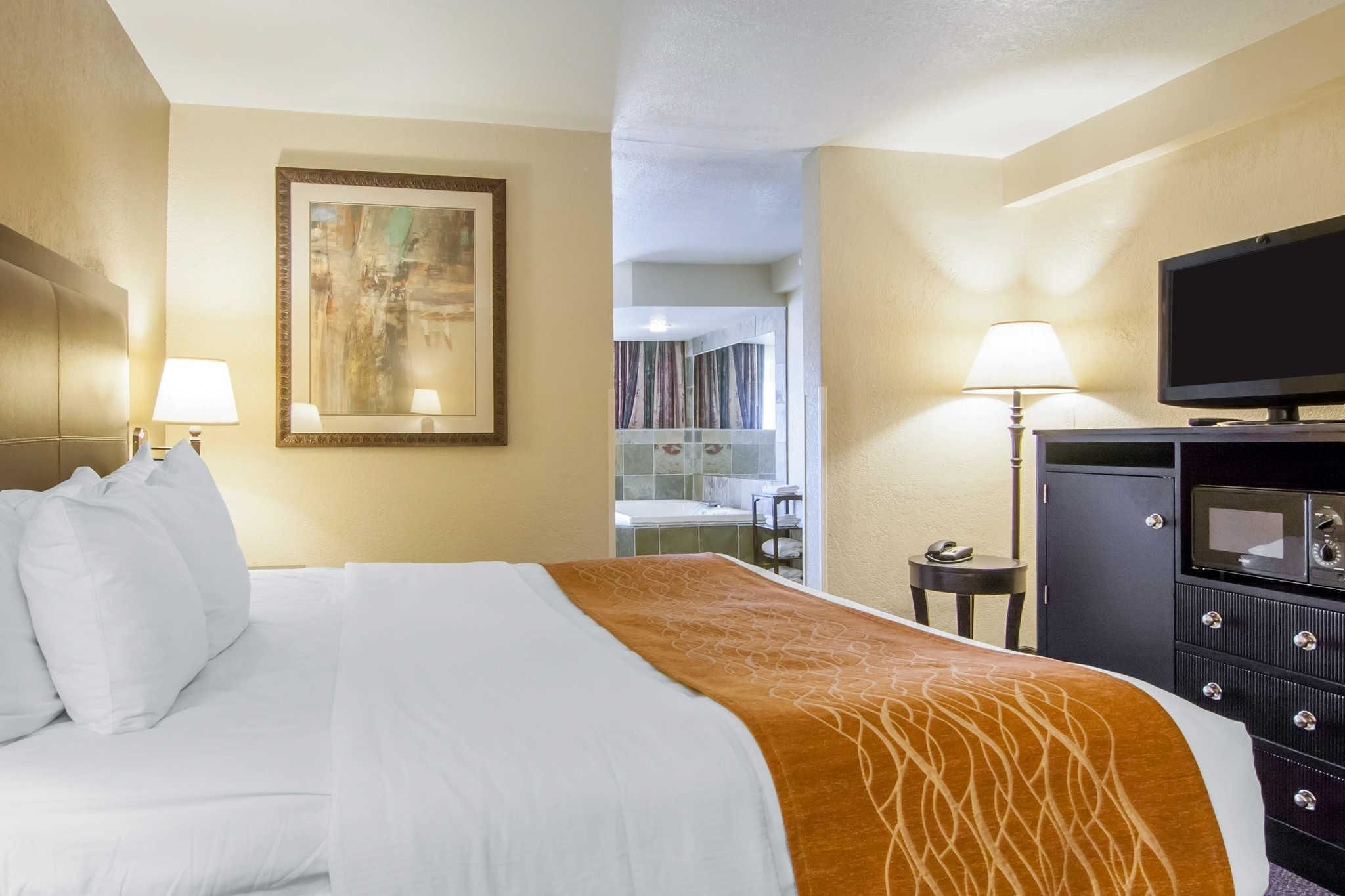 premium bedding, desk, blackout curtains, iron/ironing board