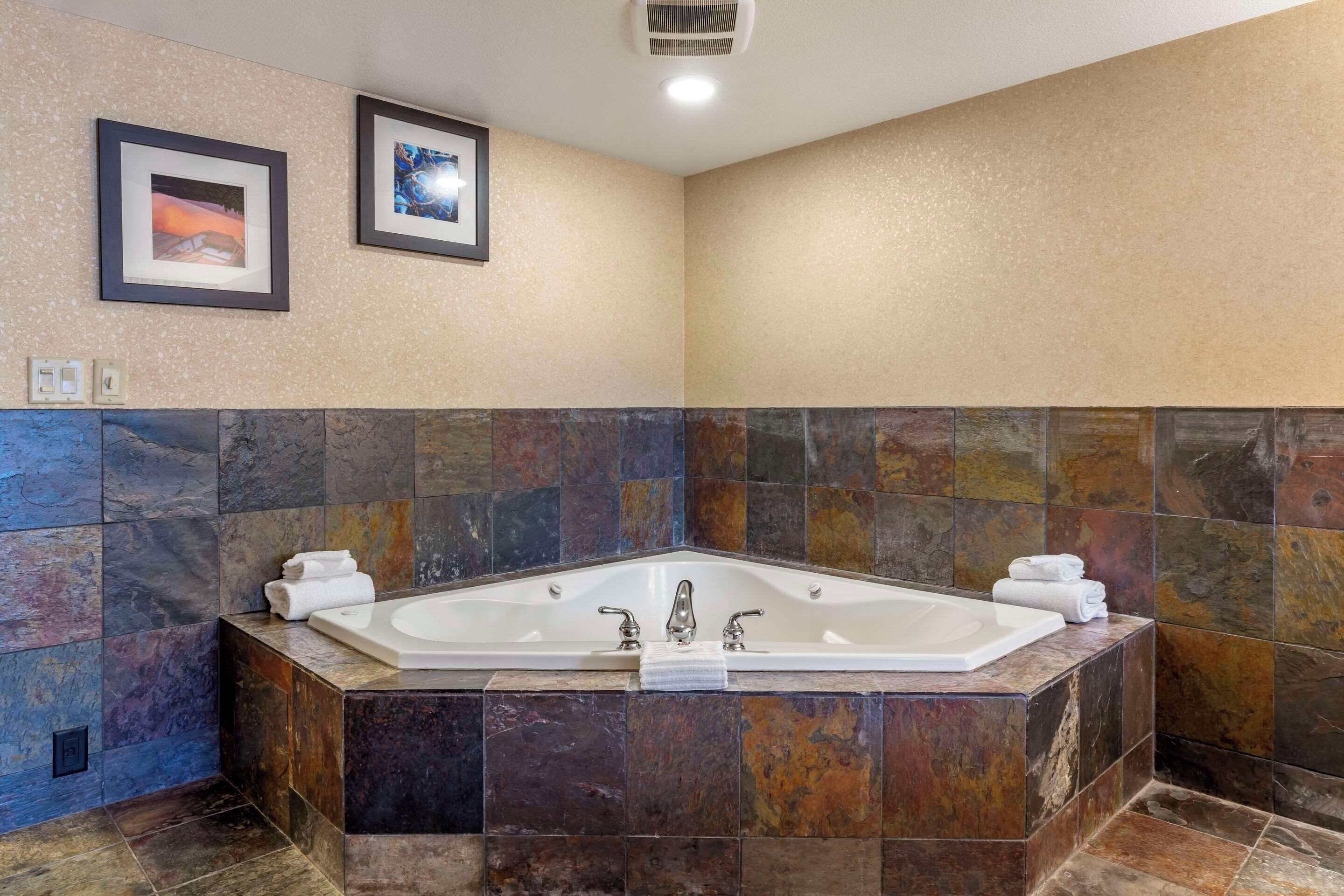 premium bedding, desk, blackout curtains, iron/ironing board