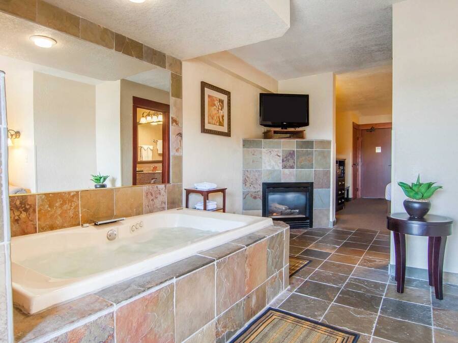 Premium bedding, desk, blackout drapes, iron/ironing board