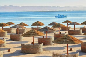 Private beach, sun-loungers, beach umbrellas, beach towels
