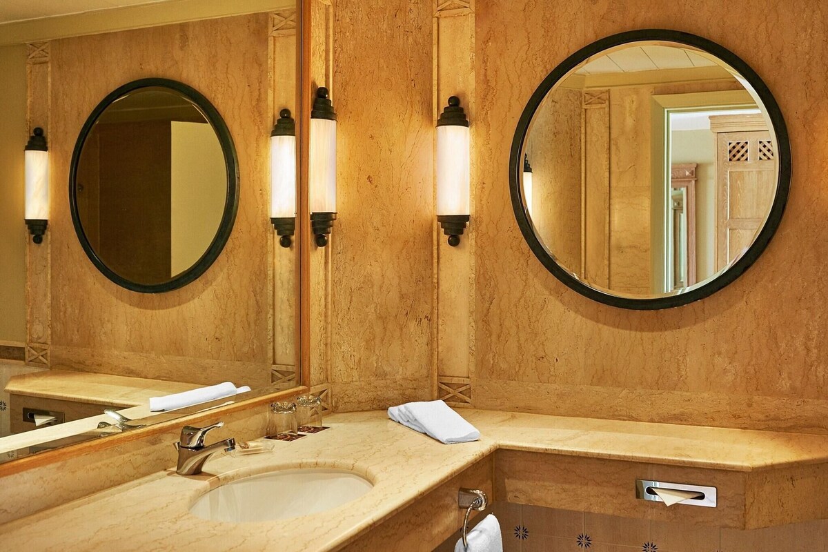 Bathroom | Designer toiletries, hair dryer, bathrobes, slippers