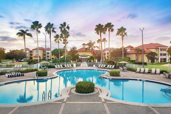 Outdoor pool, pool umbrellas, sun loungers