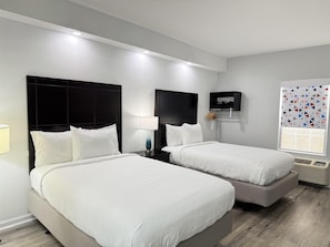 Pillow-top beds, desk, laptop workspace, iron/ironing board