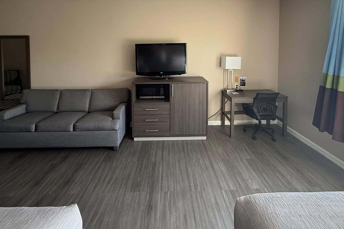 Suite, 1 King Bed with Sofa bed, Non Smoking | Desk, iron/ironing board, free WiFi, bed sheets