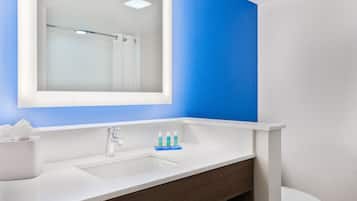 Suite, 1 King Bed (Additional Living Area) | Bathroom | Free toiletries, hair dryer, towels, soap
