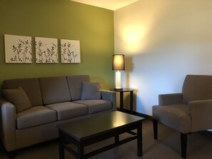 Suite, 1 King Bed, Non Smoking (Accesible) | Individually decorated, individually furnished, desk, laptop workspace