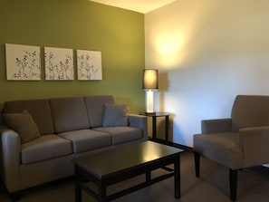 Suite, 1 King Bed, Non Smoking (Accesible) | Individually decorated, individually furnished, desk, laptop workspace