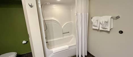 Suite, 1 King Bed, Non Smoking (with Sofabed) | Bathroom | Hair dryer, towels