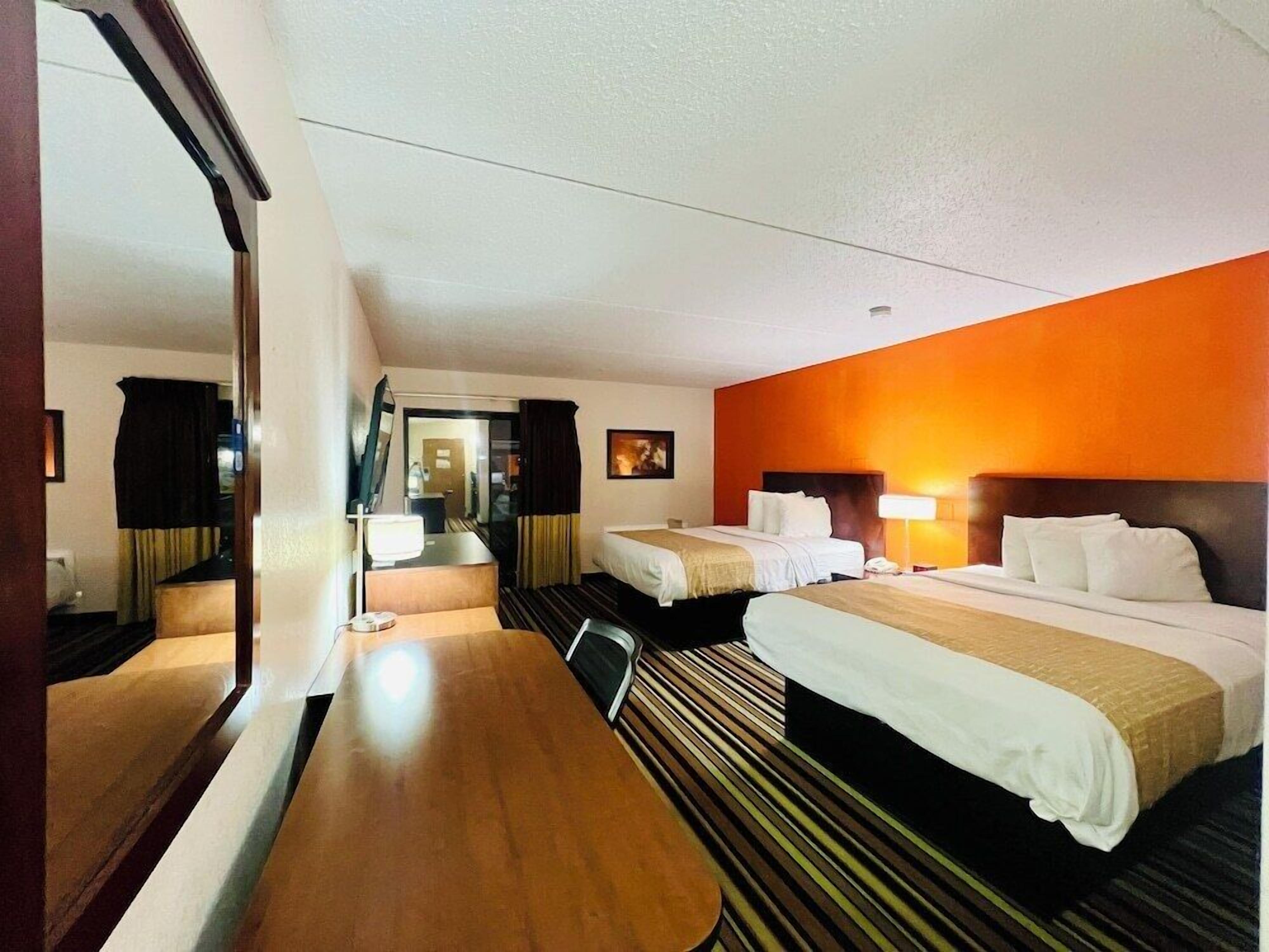 Pillow-top beds, desk, laptop workspace, blackout curtains