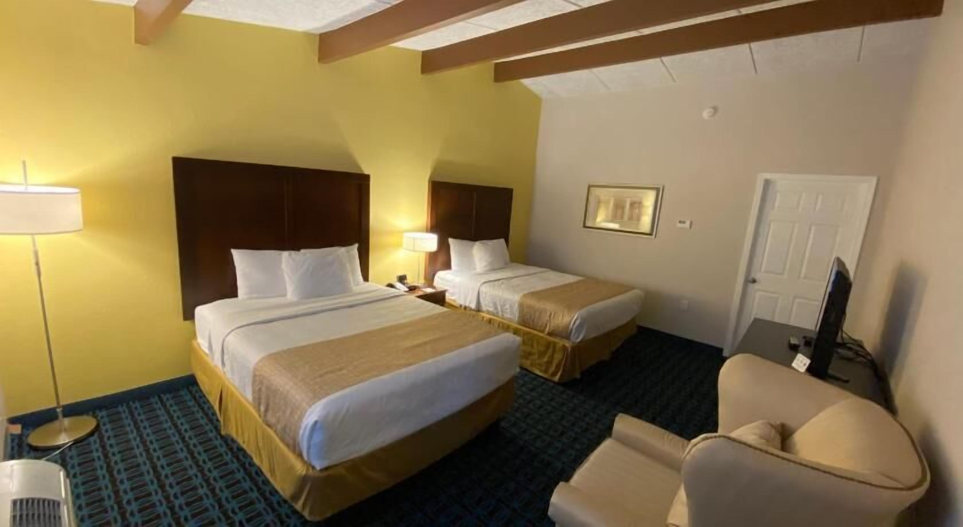 Pillow-top beds, desk, laptop workspace, blackout curtains