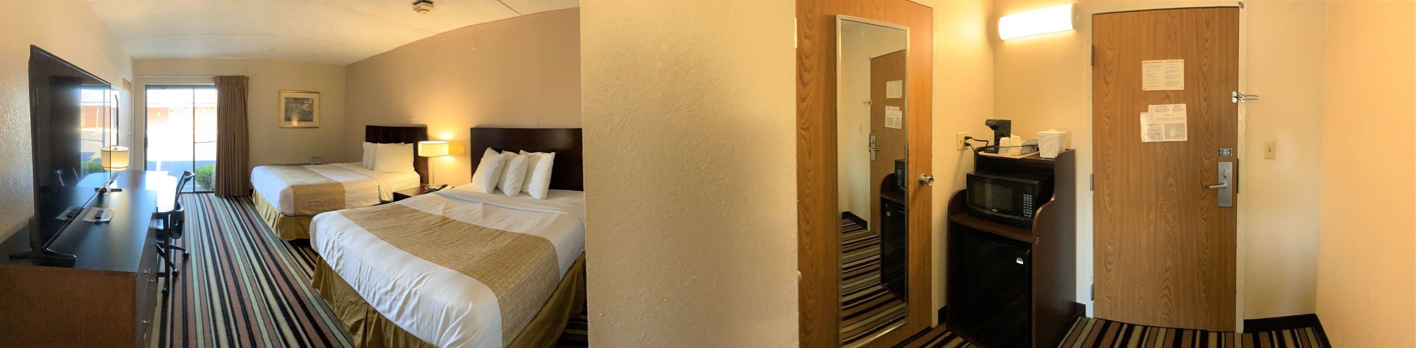 Pillow-top beds, desk, laptop workspace, blackout curtains
