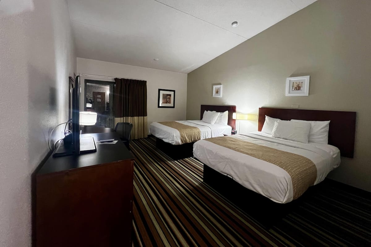 Pillowtop beds, desk, laptop workspace, blackout drapes