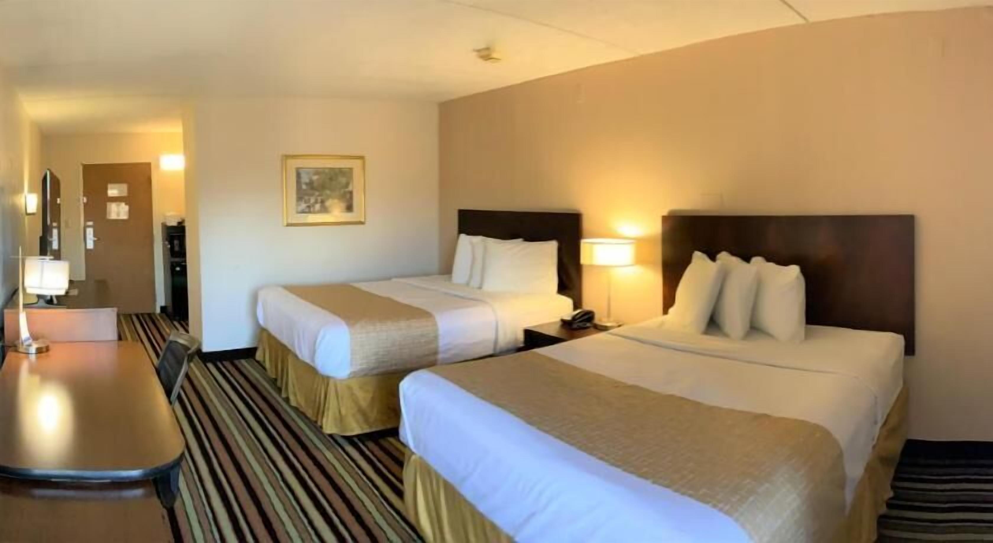Pillow-top beds, desk, laptop workspace, blackout curtains