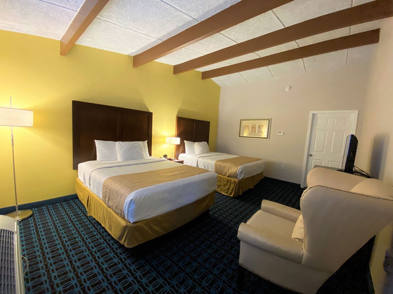 Pillow-top beds, desk, laptop workspace, blackout curtains
