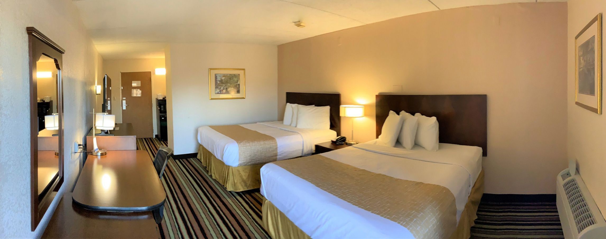 Pillow-top beds, desk, laptop workspace, blackout curtains