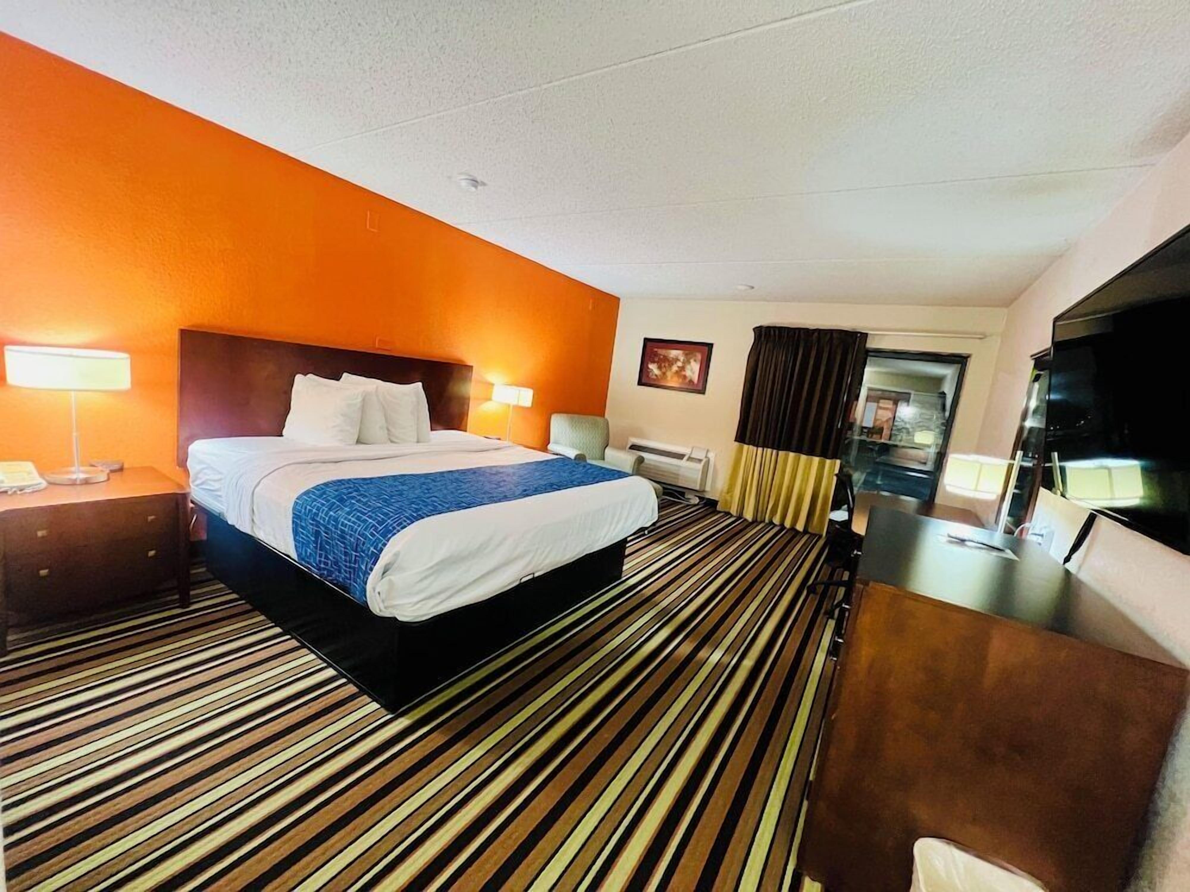 Pillow-top beds, desk, laptop workspace, blackout curtains