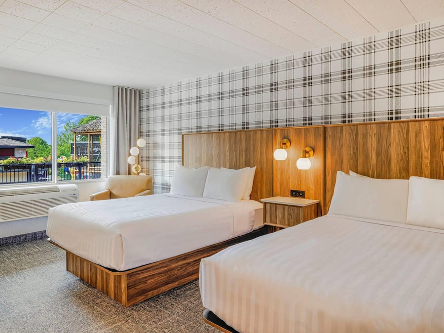 Premium Room, 2 Queen Beds, Non Smoking | In-room safe, desk, iron/ironing board, free cribs/infant beds