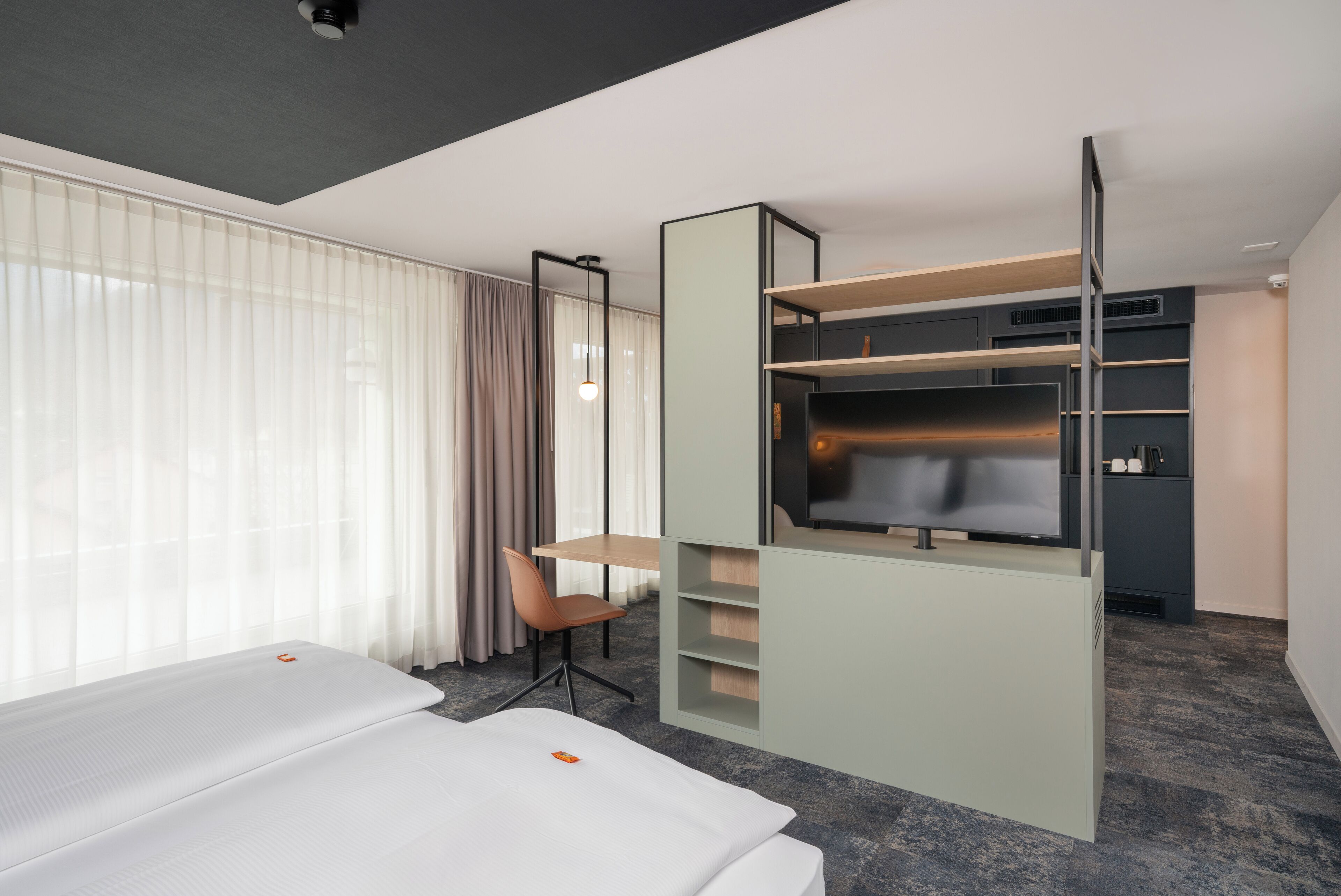 Spacious Roof Top Room | Minibar, in-room safe, individually decorated, individually furnished