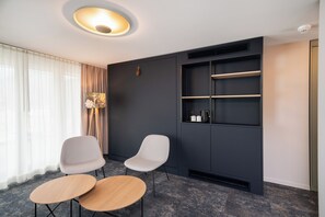 Spacious Roof Top Room | Minibar, in-room safe, individually decorated, individually furnished - Stella Swiss Quality Hotel (Interlaken)