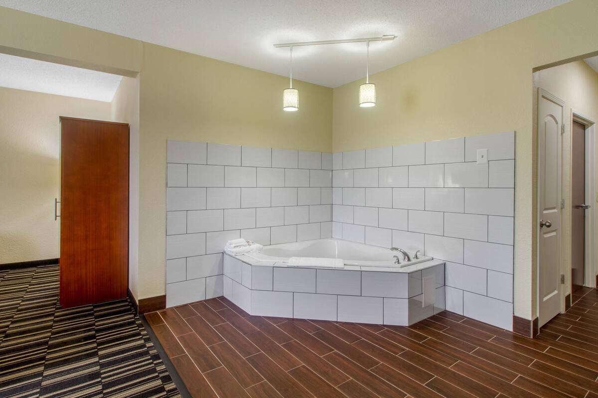 desk, blackout curtains, iron/ironing board, free cots/infant beds