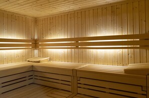 Relax in a communal sauna with U-shaped benches.