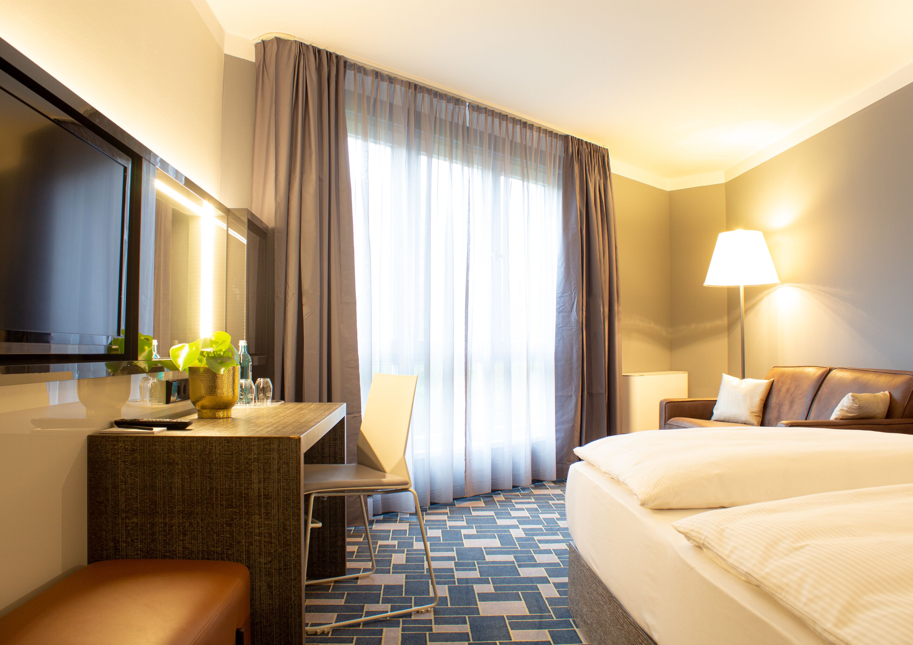 Familieværelse til 3 personer | Opholdsområde | LCD-tv, betalingsfilm