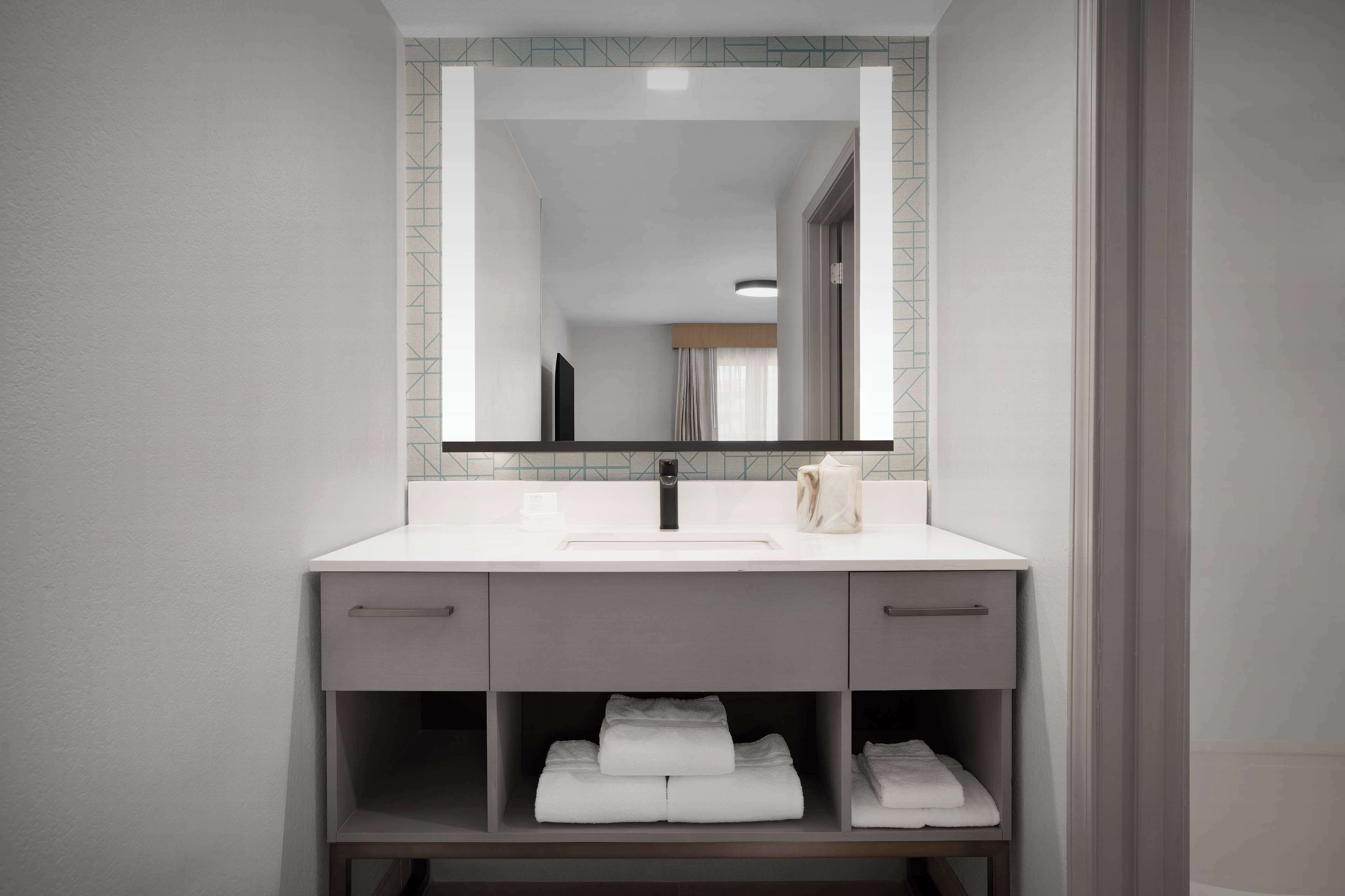 combined shower/bathtub, free toiletries, hair dryer, towels