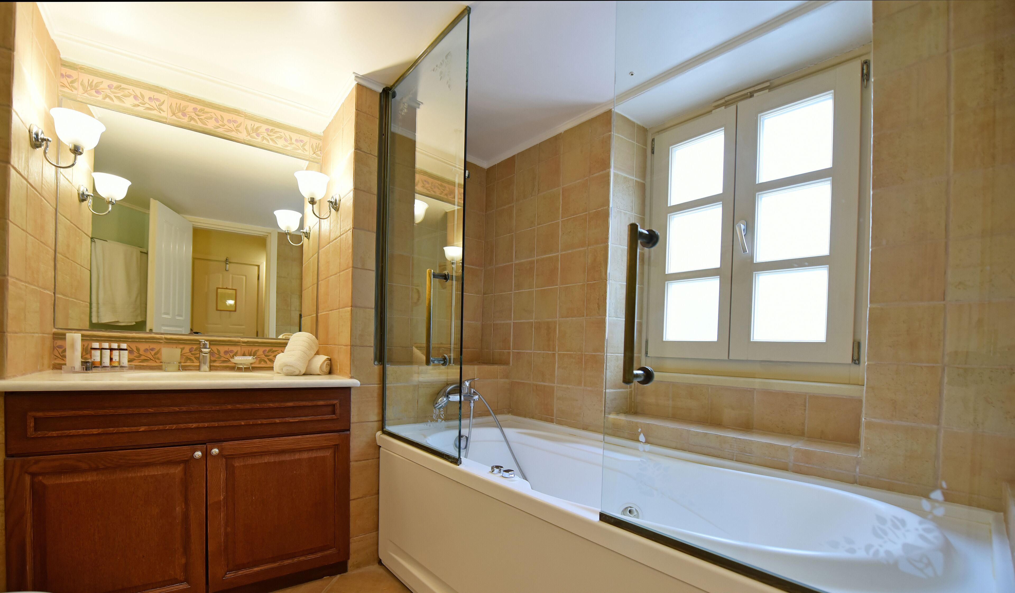 junior suite | bathroom | jetted bath, designer toiletries, hair dryer, bathrobes