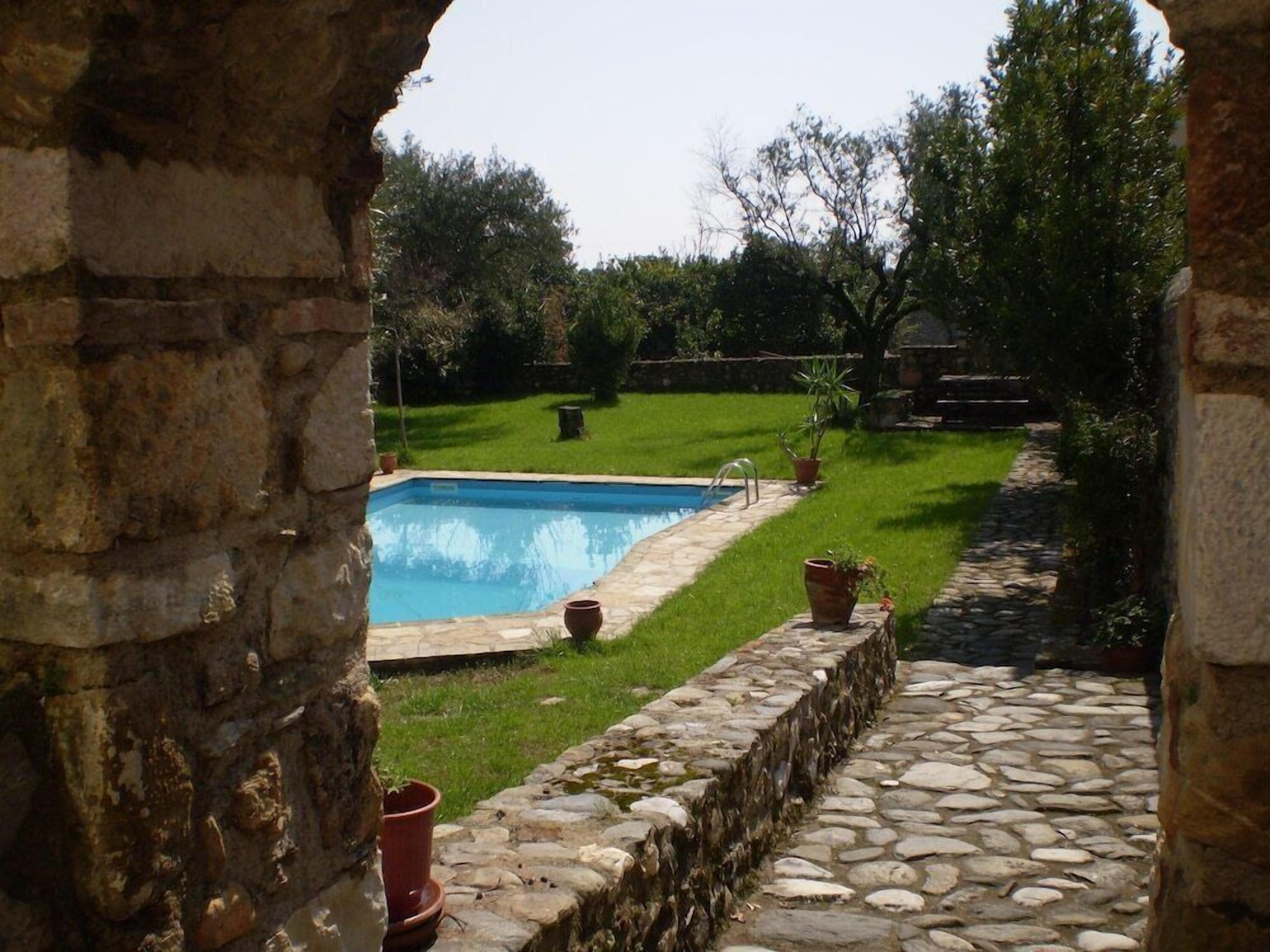 Seasonal outdoor pool, pool loungers