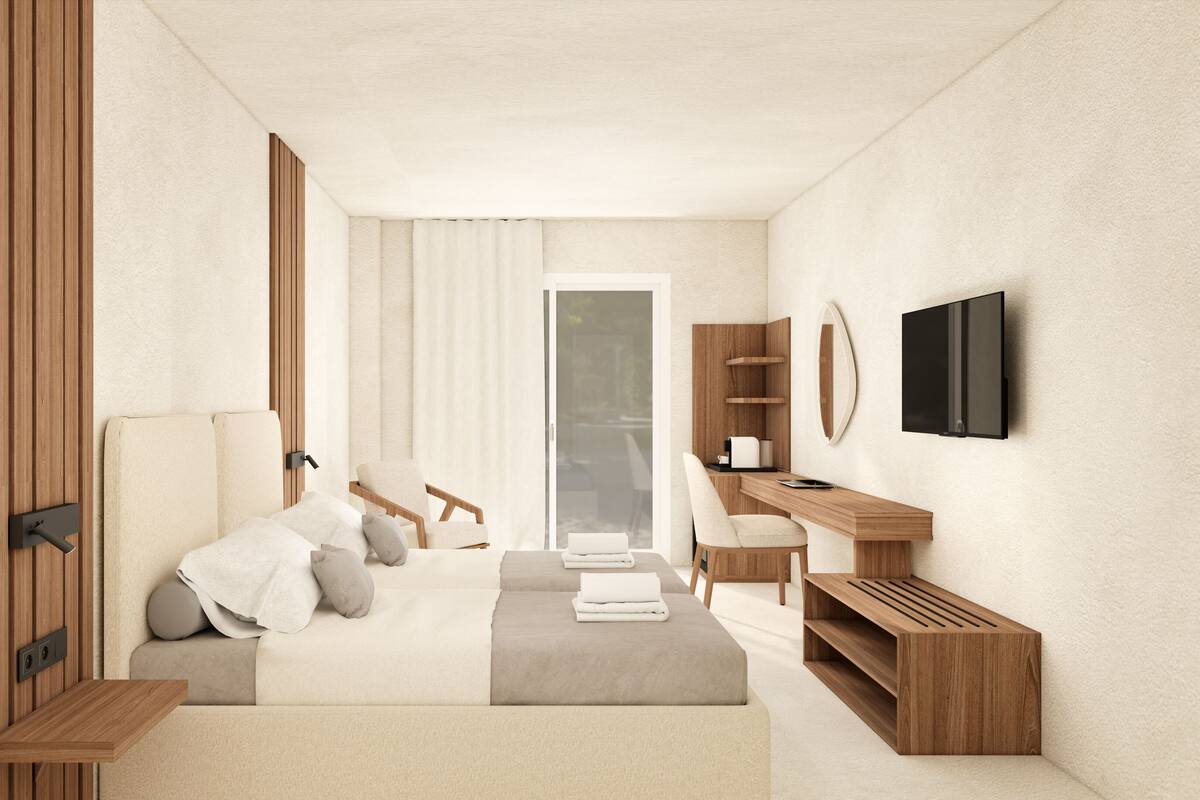 Une chambre d’hôtel moderne équipée d’un lit, d’un bureau, d’une chaise, d’une télévision et d’une porte coulissante donnant sur un balcon.