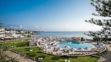 Indoor pool, 15 outdoor pools, open 10:00 AM to 6:30 PM, pool umbrellas