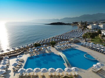 Indoor pool, 15 outdoor pools, open 10:00 AM to 6:30 PM, pool umbrellas