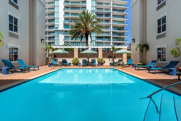 Outdoor pool, open 8:00 AM to 10:00 PM, pool umbrellas, sun loungers