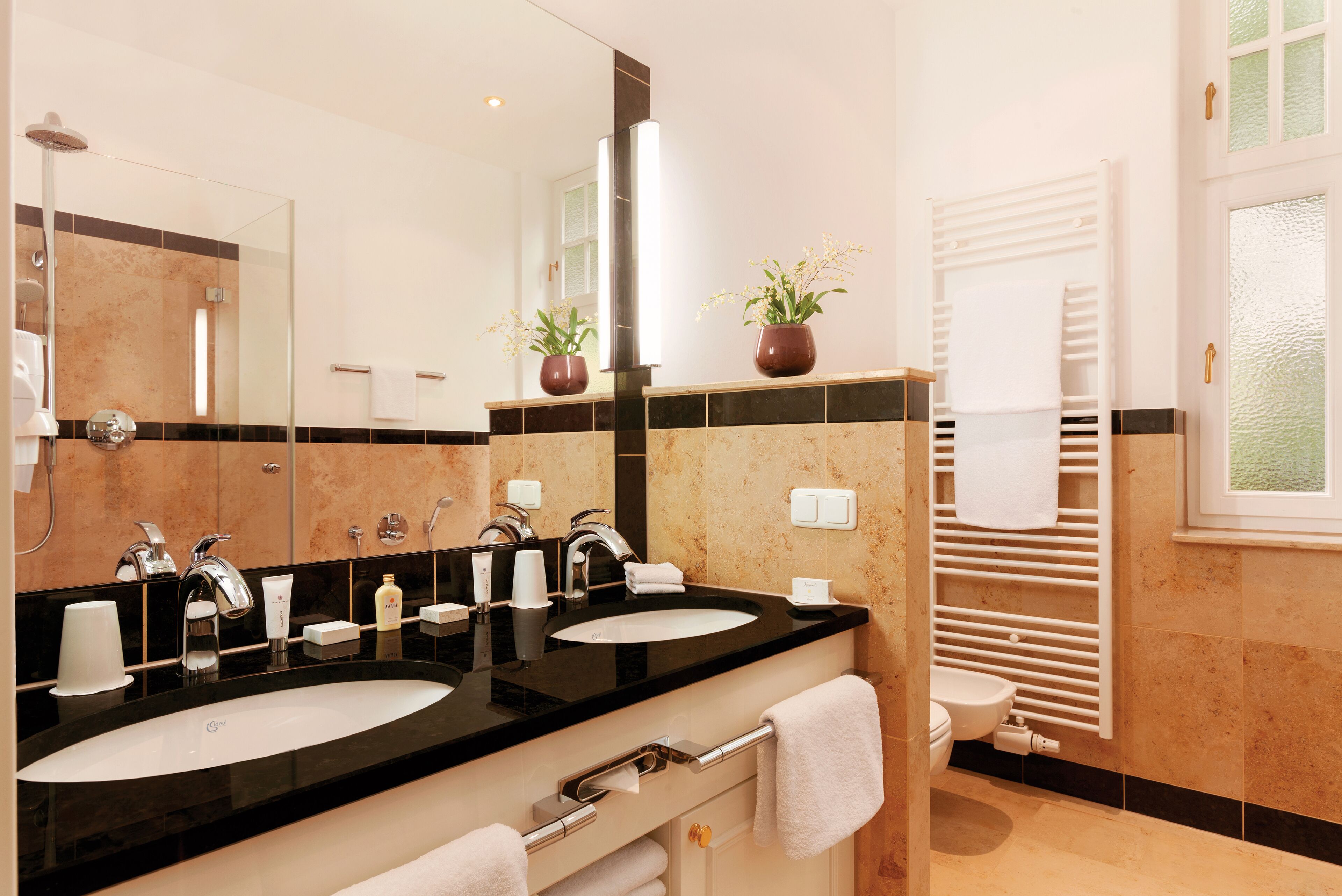 shower, free toiletries, hair dryer, bathrobes