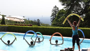 Outdoor pool, open 7:00 AM to 10:00 PM, pool loungers