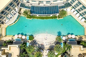 Outdoor pool, pool cabanas (surcharge), pool loungers