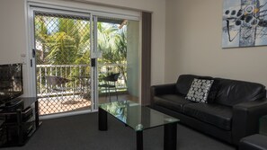 Luxury Apartment, 1 Bedroom | Living area | 32-inch LCD TV with digital channels, TV, Netflix