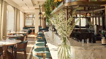 Breakfast, lunch, dinner served; pool views