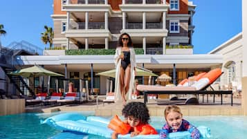 Outdoor pool, pool umbrellas, pool loungers