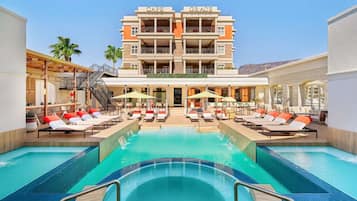 Outdoor pool, pool umbrellas, sun loungers