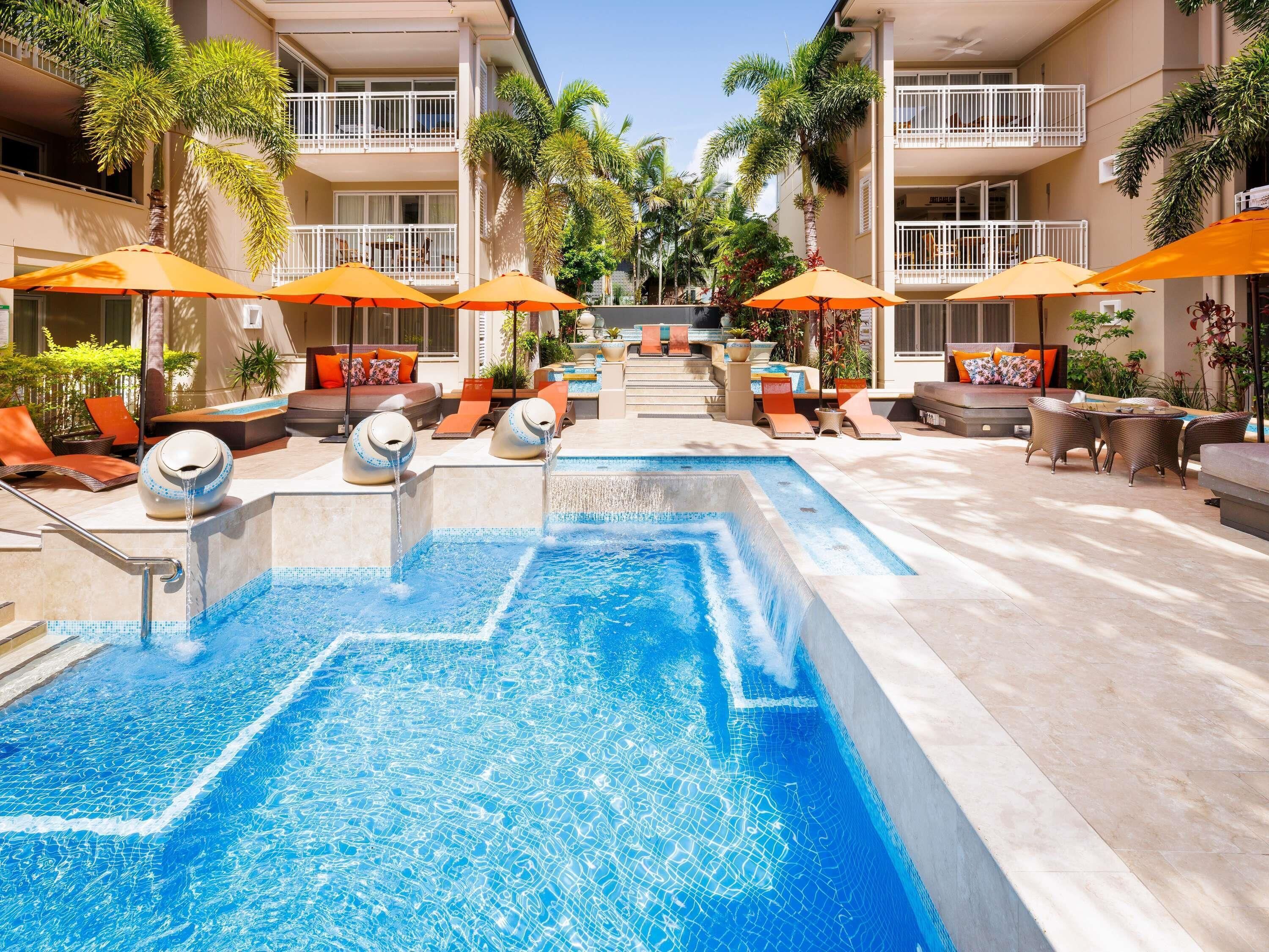Outdoor pool, pool umbrellas, sun loungers
