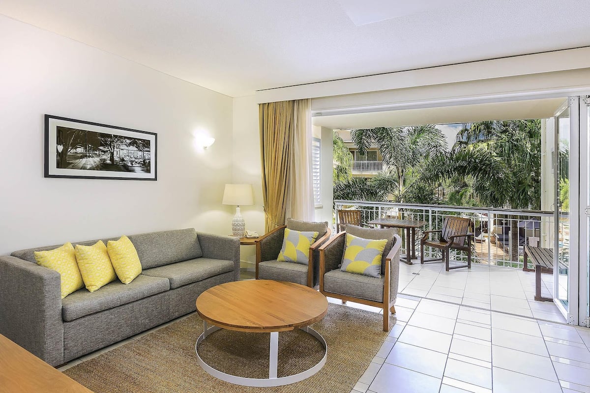 Apartment, 1 Bedroom, Pool View | 1 bedroom, minibar, in-room safe, individually decorated
