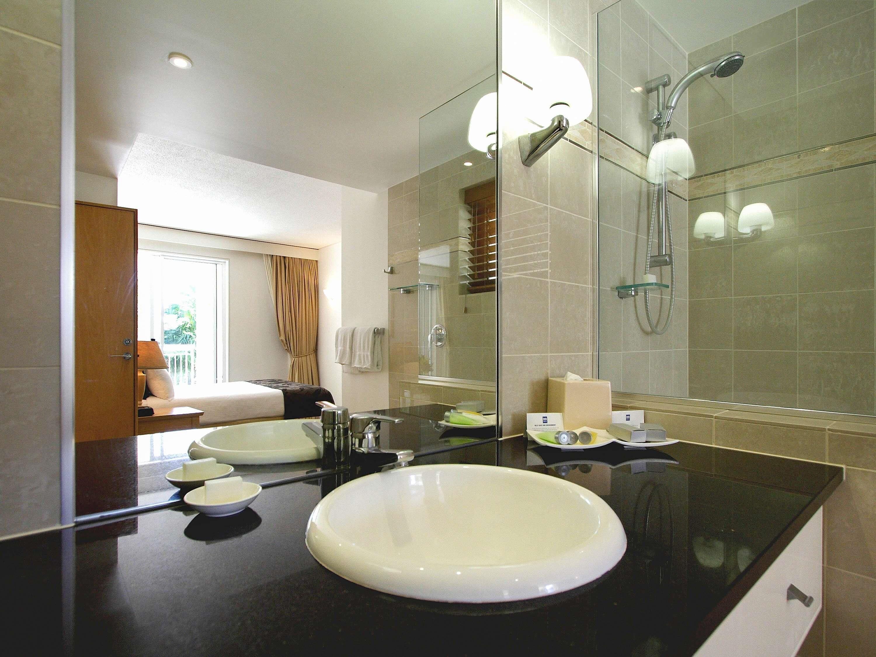 Separate tub and shower, jetted tub, designer toiletries, hair dryer