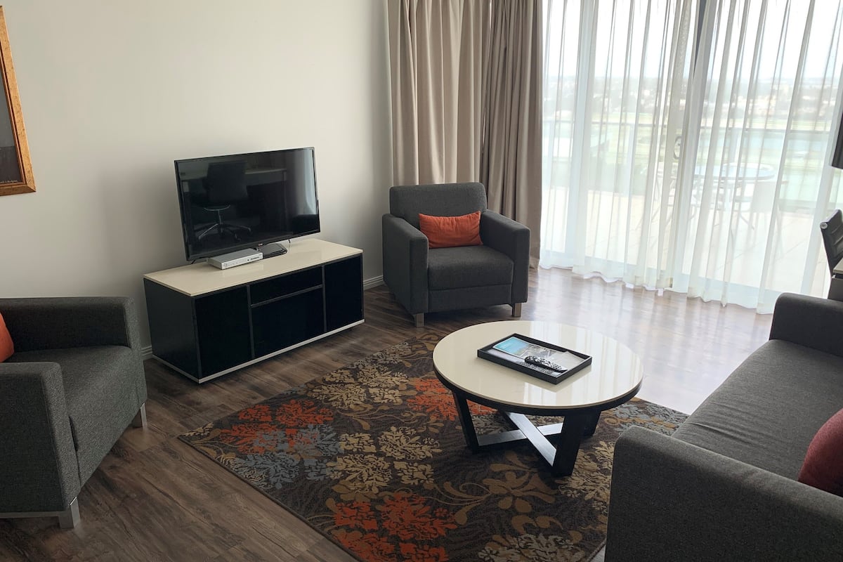 one bedroom apartment | living room | 32-inch lcd tv with digital channels, tv