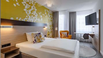 Hypo-allergenic bedding, free minibar, in-room safe, desk