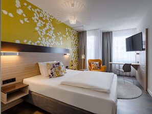 Hypo-allergenic bedding, free minibar, in-room safe, desk