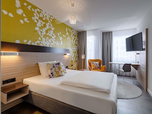 Hypo-allergenic bedding, free minibar, in-room safe, desk