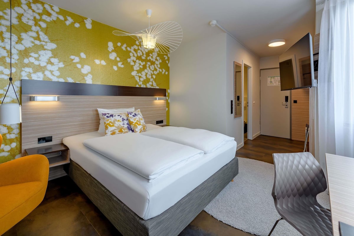 Hypo-allergenic bedding, free minibar, in-room safe, desk